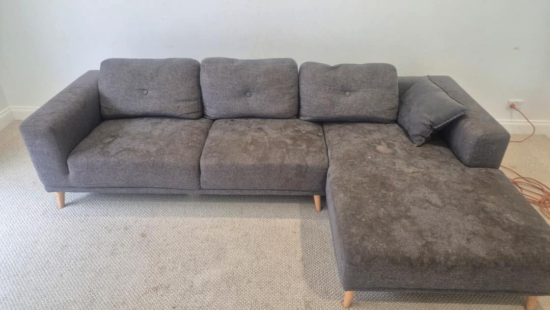 Before - grey fabric corner lounge before Ultraclean cleaning